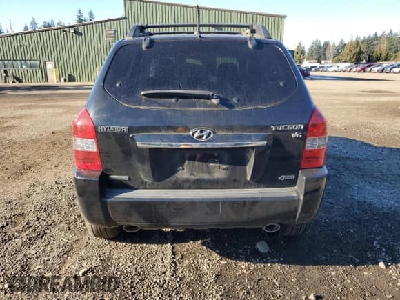 2009 Hyundai Tucson SE z VIN KM8JN72D19U944082, wystawiony jako Copart lot #42760325 z przebiegiem 190 441 mil mil oraz Szkoda całkowita • Salvage title. Historia ofert i sprzedaży dostępna na DreamBid. Obrazek 6.