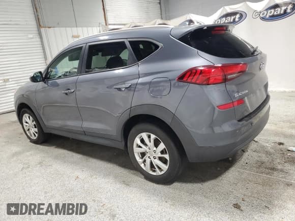 ✅ 2021 Hyundai Tucson Value • VIN: KM8J33A40MU341715 • Лот: 91839085. Опубликован ранее на Copart с пробегом 142 152 миль. Бесплатный доступ к архиву аукционных продаж из США и подробный отчёт об истории автомобиля на DreamBid. Изображение 2.