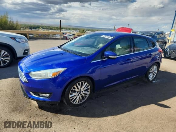 ✅ 2015 Ford Focus Titanium • VIN: 1FADP3N24FL200272 • Lot: 84259275. Wystawiony na Copart z przebiegiem 115 506 mil. Bezpłatny archiwum sprzedaży aukcyjnych z USA i szczegółowy raport historii pojazdu na DreamBid. Zdjęcie 1.