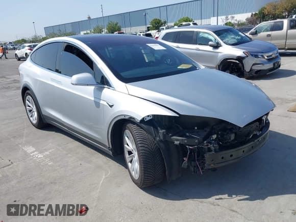 ✅ 2018 Tesla Model X 75D • VIN: 5YJXCDE26JF114207 • Lot: 42397839. Listed on IAAI with Not provided. Free auction sales archive from the USA and detailed vehicle history report at DreamBid. Image 1.