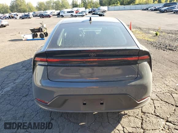 2024 Toyota Prius LE with VIN JTDADABU8R3017400, listed as a Copart auction lot 84013455 with 3,141 mi miles and Salvage title. Bid and sale history available at DreamBid. Image 6.