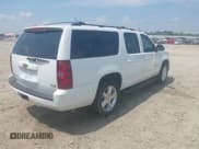 ✅ 2007 Chevrolet Suburban LT • VIN: 1GNFC16007J294395 • Lot: 42590528. Listed on IAAI with 261,070 mi. Free auction sales archive from the USA and detailed vehicle history report at DreamBid. Image 4.