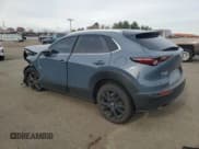 ✅ 2023 Mazda CX-30 S Carbon Edition • VIN: 3MVDMBCM7PM576612 • Лот: 91021795. Опубликован ранее на Copart с пробегом 19 796 миль. Бесплатный доступ к архиву аукционных продаж из США и подробный отчёт об истории автомобиля на DreamBid. Изображение 2.
