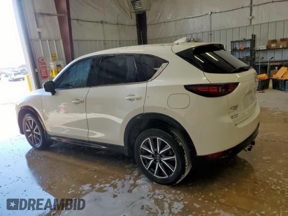 ✅ 2018 Mazda CX-5 Grand Touring • VIN: JM3KFBDM7J0344272 • Лот: 81642645. Опубликован ранее на Copart с пробегом 80 955 миль. Бесплатный доступ к архиву аукционных продаж из США и подробный отчёт об истории автомобиля на DreamBid. Изображение 2.