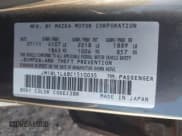 ✅ 2012 Mazda 3 S Touring • VIN: JM1BL1L68C1510035 • Lot: 43369044. Wystawiony na IAAI z przebiegiem 166 893 mil. Bezpłatny archiwum sprzedaży aukcyjnych z USA i szczegółowy raport historii pojazdu na DreamBid. Zdjęcie 9.