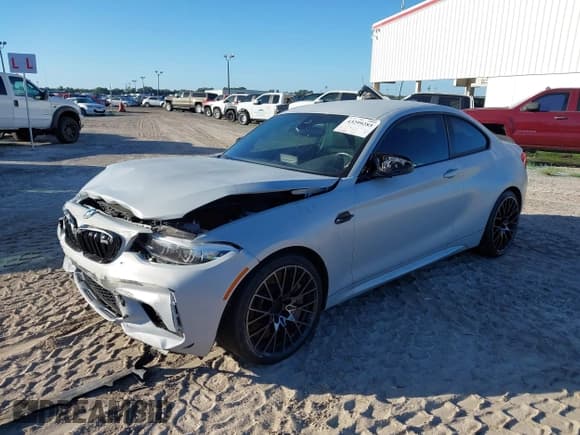 ✅ 2020 BMW M2 Competition • VIN: WBS2U7C01L7E29334 • Lot: 43299285. Listed on IAAI with 58,986 mi. Free auction sales archive from the USA and detailed vehicle history report at DreamBid. Image 2.