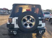 ✅ 2018 Jeep Wrangler Sahara • VIN: 1C4AJWBG2JL821132 • Lot: 42523688. Listed on IAAI with 86,244 mi. Free auction sales archive from the USA and detailed vehicle history report at DreamBid. Image 16.