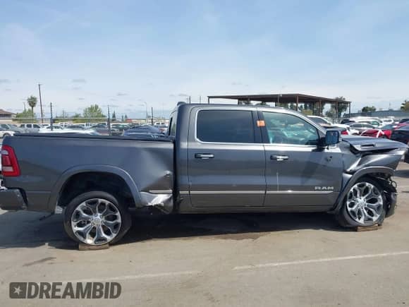 2020 Ram 1500 Limited z VIN 1C6SRFPT1LN419488, wystawiony jako IAAI lot #41847838 z przebiegiem 39 836 mil mil oraz . Historia ofert i sprzedaży dostępna na DreamBid. Obrazek 12.
