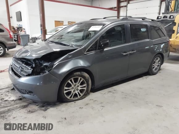 ✅ 2012 Honda Odyssey EX-L • VIN: 5FNRL5H64CB068778 • Lot: 42306089. Listed on IAAI with 337,868 mi. Free auction sales archive from the USA and detailed vehicle history report at DreamBid. Image 2.
