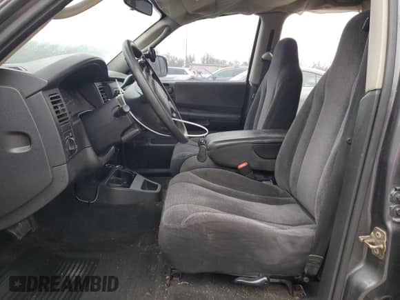 2004 Dodge Dakota SLT with VIN 1D7HL48K64S711774, listed as a Copart auction lot 84385994 with 253,318 mi miles and Clean title. Bid and sale history available at DreamBid. Image 7.