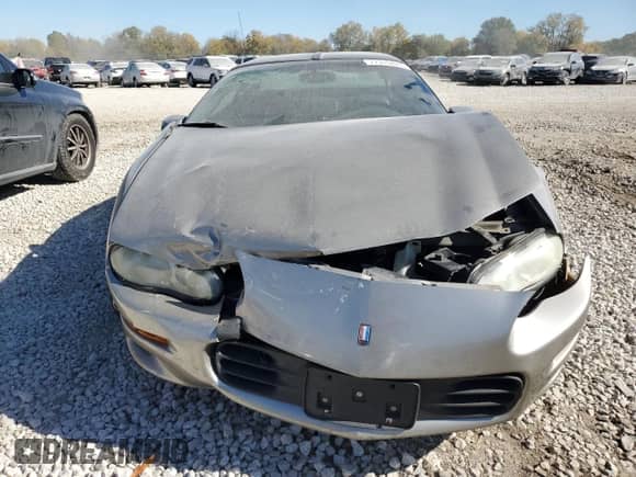 2002 Chevrolet Camaro z VIN 2G1FP22K422119101, wystawiony jako Copart lot #77315824 z przebiegiem 187 094 mil mil oraz Szkoda całkowita • Salvage title. Historia ofert i sprzedaży dostępna na DreamBid. Obrazek 5.