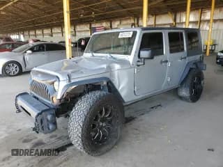 ✅ 2007 Jeep Wrangler Unlimited X • VIN: 1J4GB39117L230381 • Lot: 66312215. Listed on Copart with 169,330 mi. Free auction sales archive from the USA and detailed vehicle history report at DreamBid. Image 1.