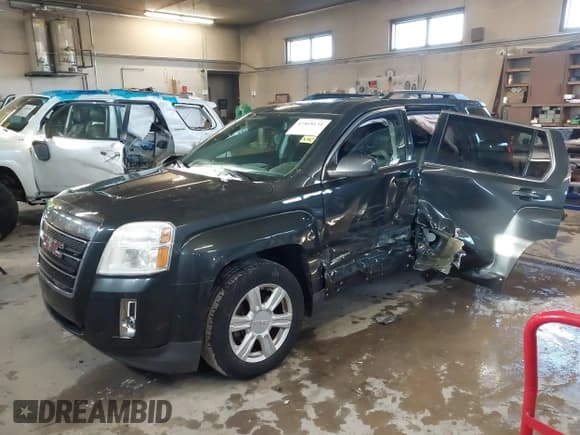 ✅ 2014 GMC Terrain SLE • VIN: 2GKFLRE35E6327621 • Lot: 41868131. Listed on IAAI with 110,612 mi. Free auction sales archive from the USA and detailed vehicle history report at DreamBid. Image 17.