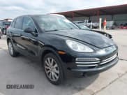 ✅ 2014 Porsche Cayenne • VIN: WP1AA2A20ELA91806 • Lot: 42293511. Listed on IAAI with 102,571 mi. Free auction sales archive from the USA and detailed vehicle history report at DreamBid. Image 1.