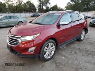 2018 Chevrolet Equinox Premier с VIN 2GNAXVEVXJ6100639, выставлен на аукционе Copart как лот 82119965 с пробегом 90 775 миль миль и Списание • Salvage title. История ставок и продаж доступна на DreamBid. Изображение 1.