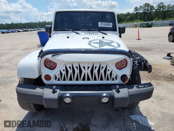 ✅ 2013 Jeep Wrangler Unlimited Freedom • VIN: 1C4HJWDG7DL591197 • Lot: 70143445. Listed on Copart with 126,677 mi. Free auction sales archive from the USA and detailed vehicle history report at DreamBid. Image 5.