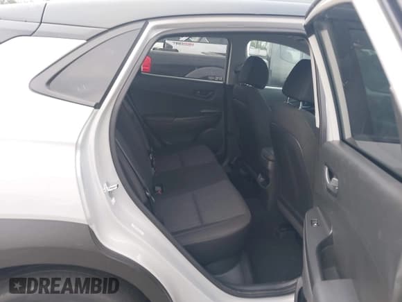 ✅ 2023 Hyundai Kona SEL • VIN: KM8K62AB7PU954861 • Лот: 43056987. Опубликован ранее на IAAI с пробегом 54 093 миль. Бесплатный доступ к архиву аукционных продаж из США и подробный отчёт об истории автомобиля на DreamBid. Изображение 8.