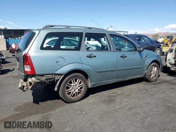 ✅ 2003 Ford Focus • VIN: 1FAHP36Z93W237843 • Lot: 82134115. Listed on Copart with 133,067 mi. Free auction sales archive from the USA and detailed vehicle history report at DreamBid. Image 3.