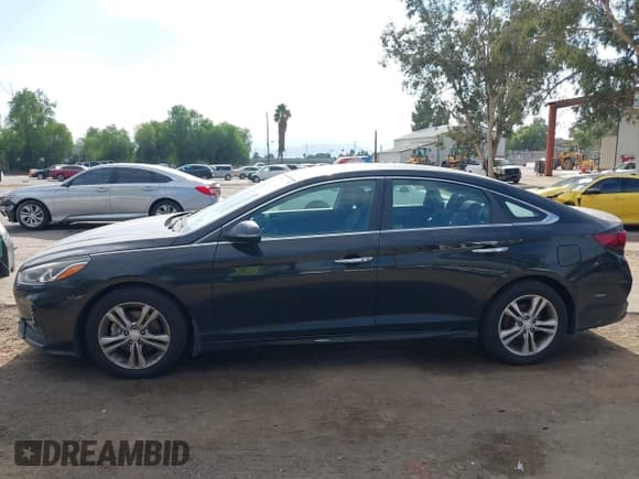 ✅ 2018 Hyundai Sonata SEL • VIN: 5NPE34AF4JH628879 • Lot: 43702428. Listed on IAAI with 121,063 mi. Free auction sales archive from the USA and detailed vehicle history report at DreamBid. Image 14.