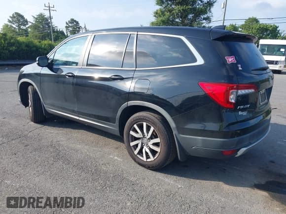 ✅ 2019 Honda Pilot EX-L • VIN: 5FNYF5H53KB000917 • Lot: 42789596. Listed on IAAI with 173,626 mi. Free auction sales archive from the USA and detailed vehicle history report at DreamBid. Image 3.