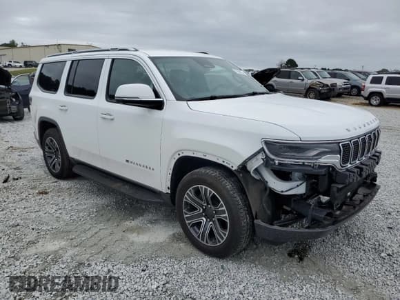 ✅ 2022 Jeep Wagoneer Series I • VIN: 1C4SJUAT8NS228393 • Lot: 71098654. Listed on Copart with 39,524 mi. Free auction sales archive from the USA and detailed vehicle history report at DreamBid. Image 4.