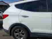 2016 Hyundai Santa Fe z VIN 5XYZU3LB5GG352375, wystawiony jako IAAI lot #43275296 z przebiegiem 161 689 mil mil oraz . Historia ofert i sprzedaży dostępna na DreamBid. Obrazek 17.