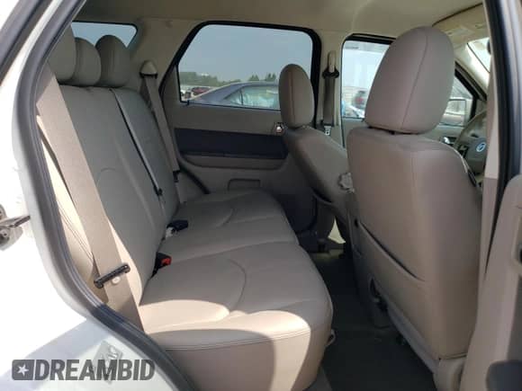 2010 Mercury Mariner Premier с VIN 4M2CN9H72AKJ24775, выставлен на аукционе Copart как лот 65381985 с пробегом 162 621 миль миль и Списание • Salvage title. История ставок и продаж доступна на DreamBid. Изображение 10.