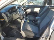 ✅ 2007 Kia Spectra • VIN: KNAFE161375004104 • Lot: 87377124. Listed on Copart with 241,076 mi. Free auction sales archive from the USA and detailed vehicle history report at DreamBid. Image 7.