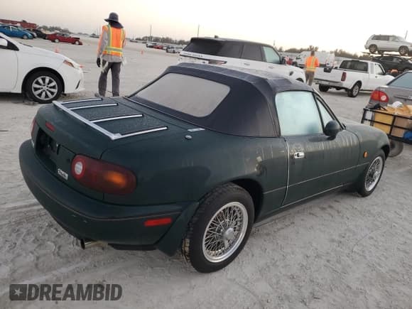 ✅ 1991 Mazda MX-5 Miata • VIN: NA6CE140418 • Lot: 77168744. Wystawiony na Copart z przebiegiem 4 992 mil. Bezpłatny archiwum sprzedaży aukcyjnych z USA i szczegółowy raport historii pojazdu na DreamBid. Zdjęcie 3.