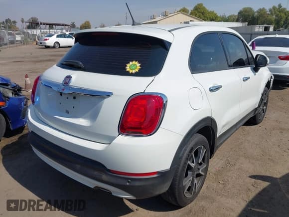 ✅ 2017 FIAT 500X Pop • VIN: ZFBCFXAB7HP606549 • Lot: 43231958. Listed on IAAI with 80,591 mi. Free auction sales archive from the USA and detailed vehicle history report at DreamBid. Image 4.
