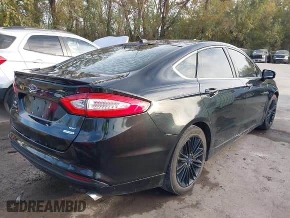 ✅ 2014 Ford Fusion SE • VIN: 3FA6P0HD8ER275741 • Lot: 43576987. Listed on IAAI with 166,507 mi. Free auction sales archive from the USA and detailed vehicle history report at DreamBid. Image 4.