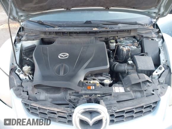 ✅ 2007 Mazda CX-7 Grand Touring • VIN: JM3ER293770103969 • Лот: 41500589. Опубликован ранее на IAAI с пробегом 214 903 миль. Бесплатный доступ к архиву аукционных продаж из США и подробный отчёт об истории автомобиля на DreamBid. Изображение 9.