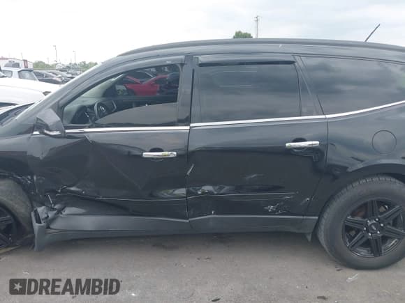 ✅ 2015 Chevrolet Traverse LT • VIN: 1GNKRHKD9FJ198777 • Lot: 42926991. Listed on IAAI with 153,634 mi. Free auction sales archive from the USA and detailed vehicle history report at DreamBid. Image 15.