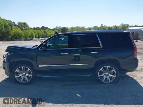 ✅ 2016 Cadillac Escalade Luxury Collection • VIN: 1GYS3BKJ3GR467513 • Lot: 42049940. Listed on IAAI with 96,301 mi. Free auction sales archive from the USA and detailed vehicle history report at DreamBid. Image 13.