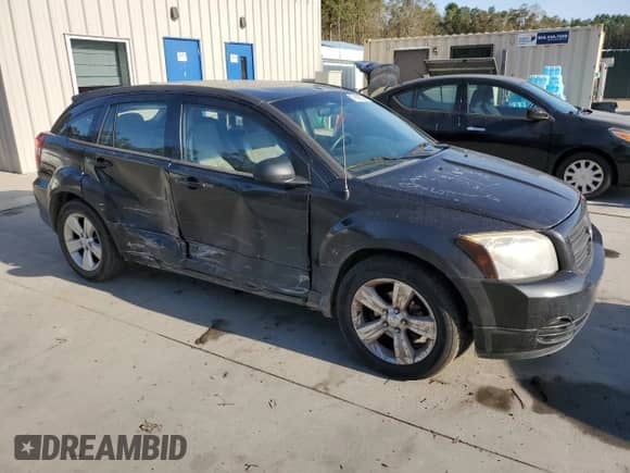 2010 Dodge Caliber SXT с VIN 1B3CB4HAXAD664717, выставлен на аукционе Copart как лот 79160684 с пробегом 187 198 миль миль и Списание • Salvage title. История ставок и продаж доступна на DreamBid. Изображение 4.