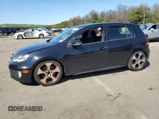 ✅ 2011 Volkswagen Golf GTI w/Sunroof & Navi PZEV • VIN: WVWHD7AJ5BW347203 • Lot: 70526504. Wystawiony na Copart z przebiegiem 98 403 mil. Bezpłatny archiwum sprzedaży aukcyjnych z USA i szczegółowy raport historii pojazdu na DreamBid. Zdjęcie 1.