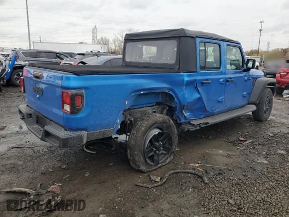 ✅ 2022 Jeep Gladiator Sport • VIN: 1C6HJTAG7NL100980 • Лот: 90792205. Опубликован ранее на Copart с пробегом 27 819 миль. Бесплатный доступ к архиву аукционных продаж из США и подробный отчёт об истории автомобиля на DreamBid. Изображение 3.