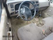 ✅ 1998 Nissan Frontier XE • VIN: 1N6DD21SXWC335532 • Lot: 65150225. Listed on Copart with 212,652 mi. Free auction sales archive from the USA and detailed vehicle history report at DreamBid. Image 8.