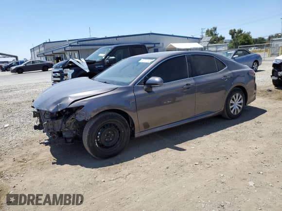 2023 Toyota Camry Hybrid LE with VIN 4T1C31AK7PU601334, listed as a Copart auction lot 63710105 with 45,242 mi miles and Salvage title. Bid and sale history available at DreamBid. Image 1.