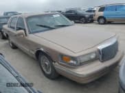 ✅ 1997 Lincoln Town Car Executive • VIN: 1LNLM81W1VY740373 • Lot: 75906494. Listed on Copart with Not provided. Free auction sales archive from the USA and detailed vehicle history report at DreamBid. Image 4.