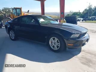 ✅ 2012 Ford Mustang V6 • VIN: 1ZVBP8AM2C5248761 • Lot: 43865595. Listed on IAAI with 217,825 mi. Free auction sales archive from the USA and detailed vehicle history report at DreamBid. Image 1.