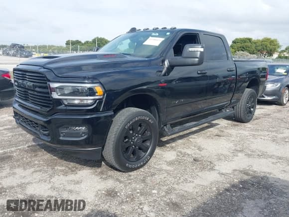 ✅ 2024 Ram 2500 Laramie • VIN: 3C6UR5FL3RG141327 • Lot: 41390825. Listed on IAAI with 8,002 mi. Free auction sales archive from the USA and detailed vehicle history report at DreamBid. Image 2.