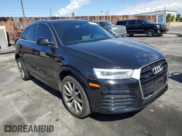 ✅ 2018 Audi Q3 Premium Plus • VIN: WA1JCCFS9JR008921 • Лот: 85890115. Опубликован ранее на Copart с пробегом 99 525 миль. Бесплатный доступ к архиву аукционных продаж из США и подробный отчёт об истории автомобиля на DreamBid. Изображение 4.