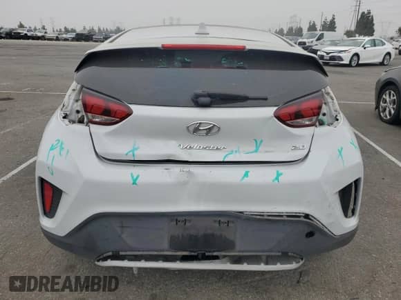 2020 Hyundai Veloster 2.0 z VIN KMHTG6AF6LU027629, wystawiony jako Copart lot #76408204 z przebiegiem 74 849 mil mil oraz Szkoda całkowita • Salvage title. Historia ofert i sprzedaży dostępna na DreamBid. Obrazek 6.