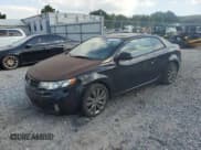 ✅ 2012 Kia Forte SX • VIN: KNAFW6A35C5614308 • Lot: 84934355. Listed on Copart with 163,757 mi. Free auction sales archive from the USA and detailed vehicle history report at DreamBid. Image 1.