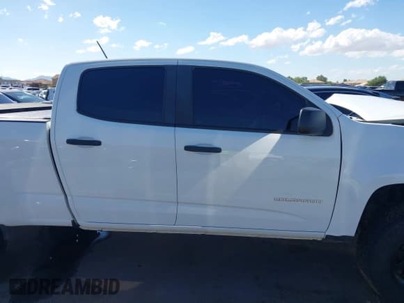 ✅ 2021 Chevrolet Colorado 2WD Work Truck • VIN: 1GCGSBEN0M1100334 • Лот: 43433489. Опубликован ранее на IAAI с пробегом 87 605 миль. Бесплатный доступ к архиву аукционных продаж из США и подробный отчёт об истории автомобиля на DreamBid. Изображение 14.