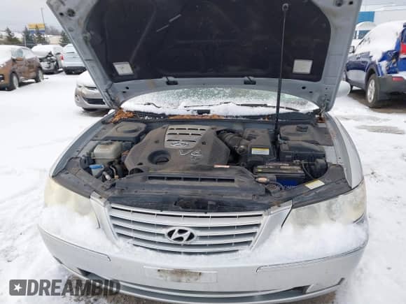 2006 Hyundai Azera SE z VIN KMHFC46F46A093575, wystawiony jako IAAI lot #41259753 z przebiegiem 164 453 mil mil oraz . Historia ofert i sprzedaży dostępna na DreamBid. Obrazek 10.