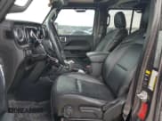 ✅ 2021 Jeep Wrangler Unlimited Sahara • VIN: 1C4HJXEN0MW836147 • Лот: 89630805. Опубликован ранее на Copart с пробегом 49 024 миль. Бесплатный доступ к архиву аукционных продаж из США и подробный отчёт об истории автомобиля на DreamBid. Изображение 7.