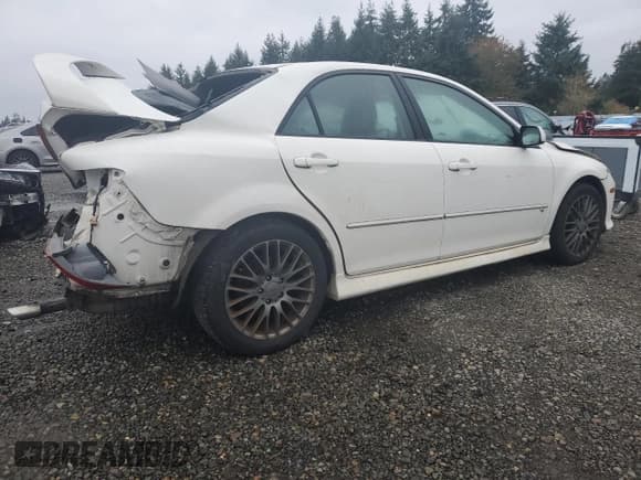 ✅ 2003 Mazda 6 s • VIN: 1YVHP80D435M20104 • Lot: 90927995. Listed on Copart with 156,147 mi. Free auction sales archive from the USA and detailed vehicle history report at DreamBid. Image 3.