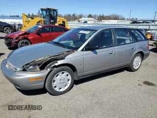 ✅ 1997 Saturn SW • VIN: 1G8ZK8274VZ194085 • Лот: 50230135. Опубликован ранее на Copart с пробегом 211 051 миль. Бесплатный доступ к архиву аукционных продаж из США и подробный отчёт об истории автомобиля на DreamBid. Изображение 1.